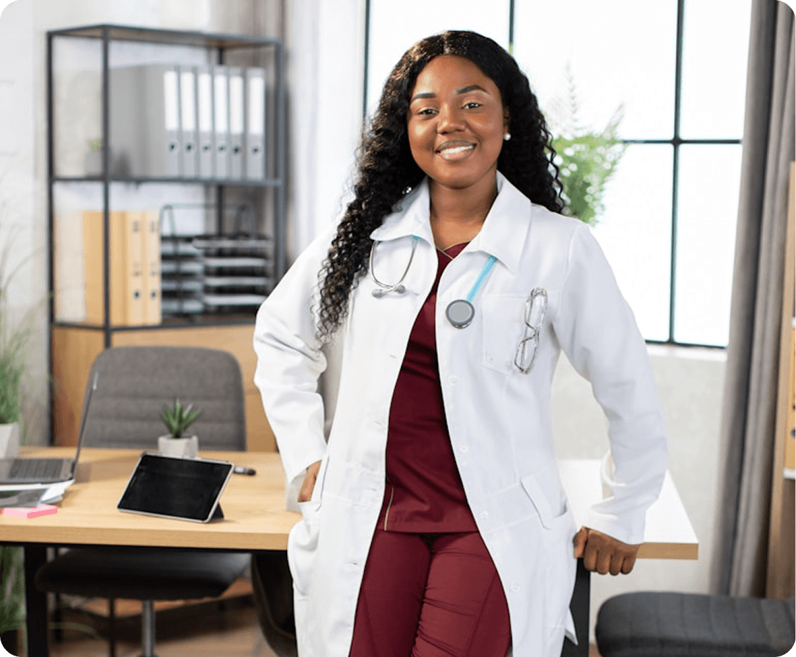 A smiling provider in her office